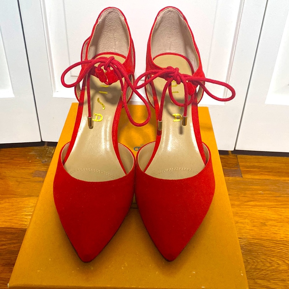 Red Suede Unisa Heels. Size 7.5. Like new, only wore once.